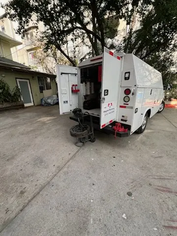 Magnet Plumbing service vehicle on-site for Grease Trap Cleaning in Kodiak